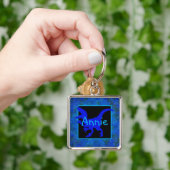 Persoonlijke blauwe dinosaur verbergen sleutelhanger (Hand)