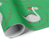 Persoonlijke kerstdinosaurus in boeken cadeaupapier (Rol Hoek)