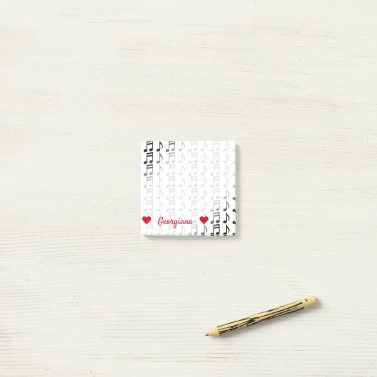 Persoonlijke naam + raster van muzieknotities post-it® notes (Op bureau)