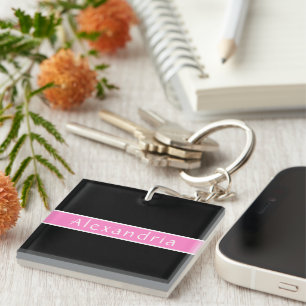 Persoonlijke naam zwart en roze sleutelhanger