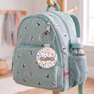 Persoonlijke schooltaslabel met vlindermeisje en b sleutelhanger