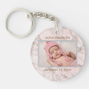 Persoonlijke sleutelhanger met foto op roze marmer