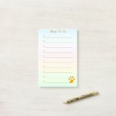 Persoonlijke taken en gouden poot post-it® notes (Op bureau)
