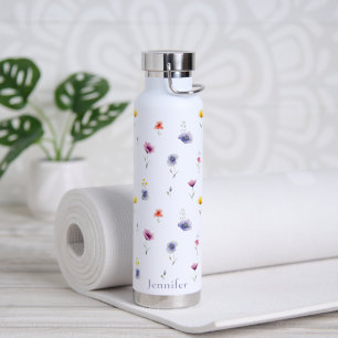 Persoonlijke waterfles met geïsoleerde wilde bloem