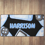 Persoonlijke Waterverf Blue Gaming Bureaumat<br><div class="desc">Introductie van onze nieuwste must-have kinder gaming accessoire - de blauwe thema aangepaste Desk Top Mat! Ontworpen heeft een zwarte achtergrond, met waterverf blauwe controllers, consoles en is gepersonaliseerd met hun naam in een leuk bellenlettertype. Deze mat is voorzien van antislip achterkant om uitglijden en glijden te voorkomen en tegelijkertijd...</div>