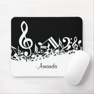 Persoonlijke witte joumloge muzieknotities op zwar muismat