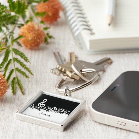 Persoonlijke witte joumloge muzieknotities op zwar sleutelhanger (Zijkant)