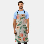 Perzikboomtakken met bladeren en vruchten op een l schort (Gedragen)