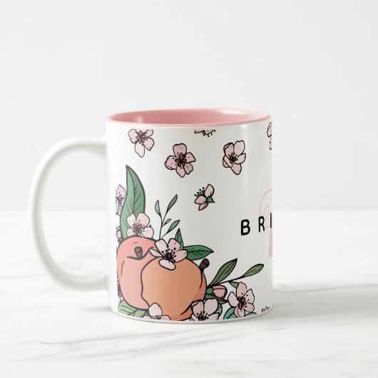  perziken en perzikroze monogram bloesem tweekleurige koffiemok (Links)
