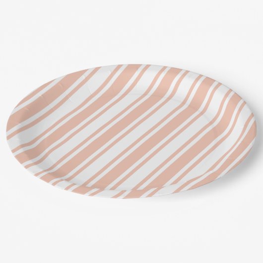Perziken en witte snoepjes strepen papieren bordje (Gekanteld)