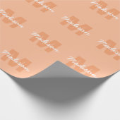 Perzikkleur van 2024 met de naam van het douanemon cadeaupapier (Hoek)