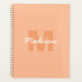 Perzikkleur van 2024 met de naam van het douanemon planner (Voorkant)