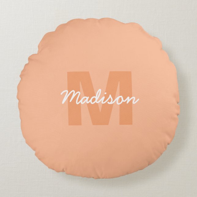 Perzikkleur van 2024 met de naam van het douanemon rond kussen (Voorkant)