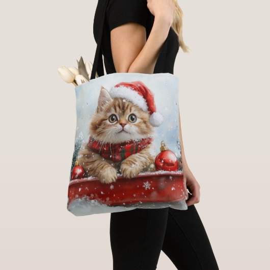 Perzische kat in slee laat het sneeuwen Kerstmis Tote Bag (Dichtbij)