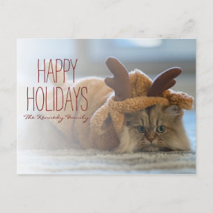 Perzische kat op tapijt in rendierkostuum feestdagenkaart