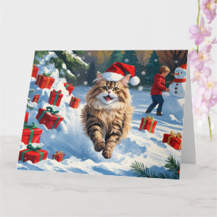 Perzische kat zit in de sneeuw met kerstmuts kaart