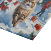 Perzische kat zit in de sneeuw met kerstmuts snijplank (Hoek)