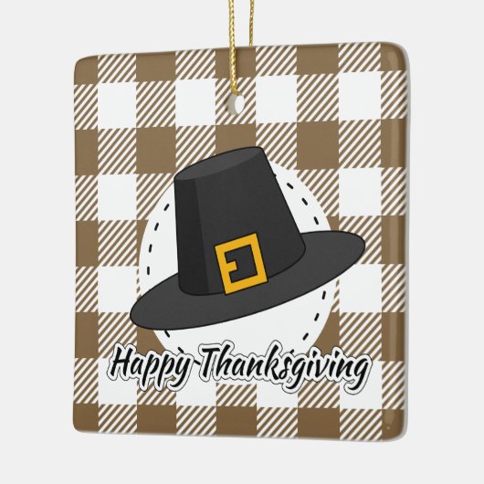 Pet van de zwarte pelgrim op bruine speldenstaart  keramisch ornament (Links)