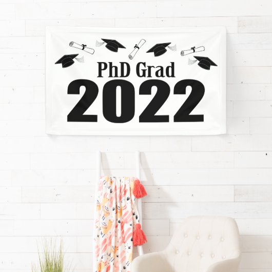 PhD Afstudeerder 2022 Petten en diploma's (zwart) Spandoek (Insitu)