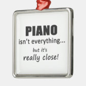 Piano is niet alles metalen ornament (Links)