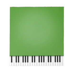 Piano-toetsenbord met groene 5,5x6-muziek notitieblok