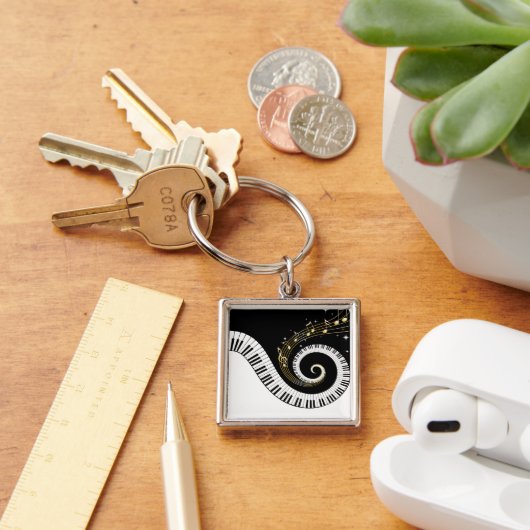 Pianosleutels en goudMuzieknoten Sleutelhanger (Bureau)