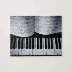 Pianosleutels en muziekboek legpuzzel