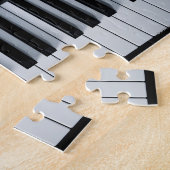 Pianosleutels en muziekboek legpuzzel (Zijkant)