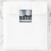 Pianosleutels en muziekboek vierkante sticker (Tas)