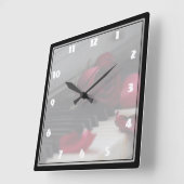 Pianosleutels met een rode roze vierkante klok (Hoek)