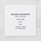 Pianosleutels met een rode roze vierkante visitekaartje (Achterkant)