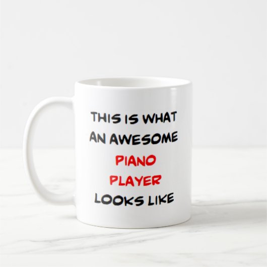 pianospeler, geweldige koffiemok (Links)