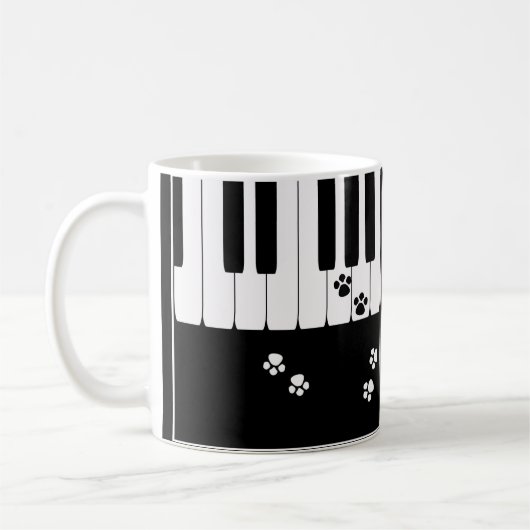 Pianotoetsen en kattenpootjes koffiemok (Links)
