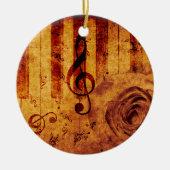 Pianotoetsen met muzieknotities en roos keramisch ornament (Voorkant)