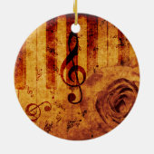 Pianotoetsen met muzieknotities en roos keramisch ornament (Achterkant)