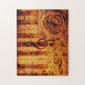 Pianotoetsen met muzieknotities en roos legpuzzel (Verticaal)