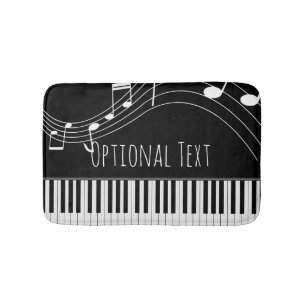 Pianotoetsenbord en muzieknotities badmat