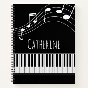 Pianotoetsenbord en muzieknotities notitieboek