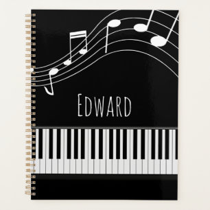 Pianotoetsenbord en muzieknotities planner