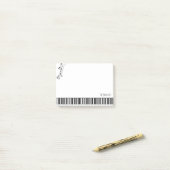 Pianotoetsenbord en muzieknotities post-it® notes (Op bureau)