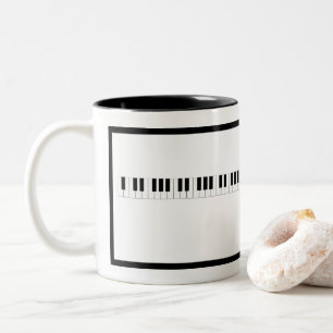 Pianotoetsenbord met rand tweekleurige koffiemok