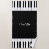 Pianotoetsenbord, zwart en wit strandlaken (Voorkant)
