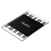 Pianotoetsenbord, zwarte en witte laptop notitieboek (Linkerzijde)