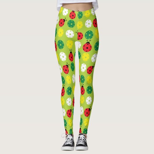 Pickleball ladybugs en picklaballs op vers groen leggings (Voorkant)