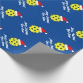 Pickleball met kerstmuts inpakpapier (Hoek)