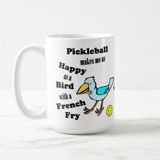 Pickleball - zo blij als een vogel met een frietje koffiemok (Links)