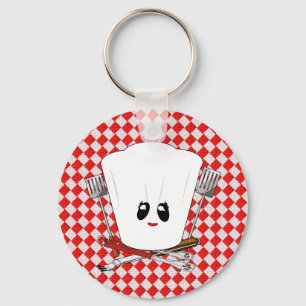 Picknicktafel met vrouwen kookmuts en BBQ-gereedsc Sleutelhanger