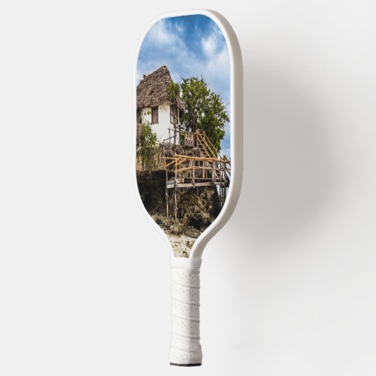 Pictureskast op een tropisch koraal pickleball paddle (Links)