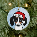 Piebald Dachshund Santa Wiener Dog Aangepaste naam Keramisch Ornament<br><div class="desc">Een schattig geborduurd Dachshund kerstornament dat kan worden gepersonaliseerd met uw eigen tekst. Voeg naam toe voor een leuk cadeau op maat. Maakt een schatrijk ornament om te laten zien op de kerstboom voor de komende jaren. Bezoek Jenn’s Doodle World voor nog meer vakantiegiften met dit schattige wiener hondenontwerp en...</div>