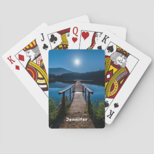 Pier bij nacht onder een volle maan pokerkaarten